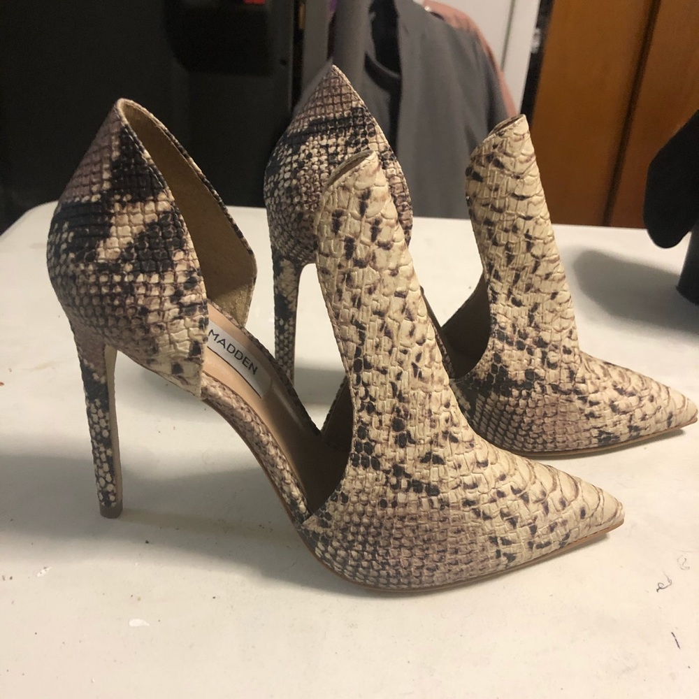 Snake skin pumps.